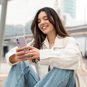 Lady views her smartphone