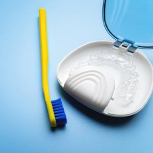 Toothbrush near clear aligner