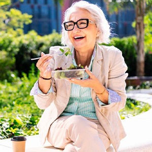 Lady eats salad