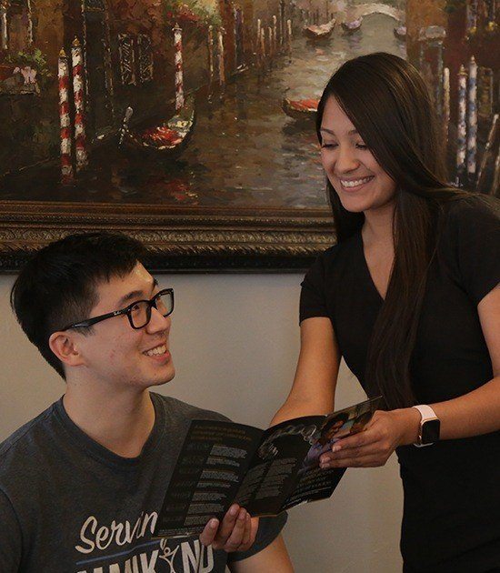 Team member showing dental patient insurance information