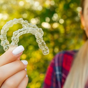 Teen shows off Invisalign aligners
