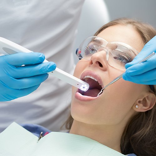 Dentist capturing intraoral images