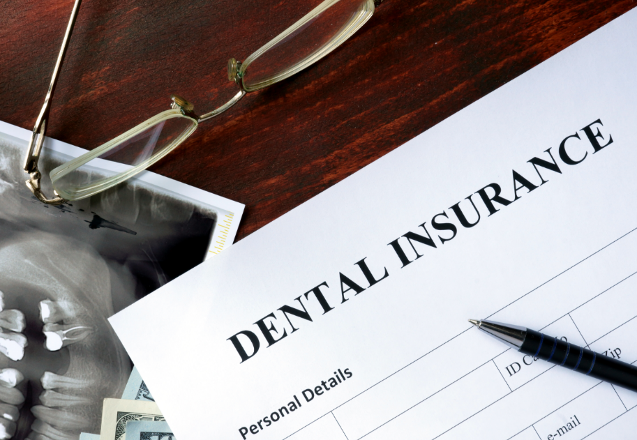 Dental insurance papers on a desk